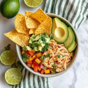 Crockpot Fajita Salsa Chicken served with fresh toppings